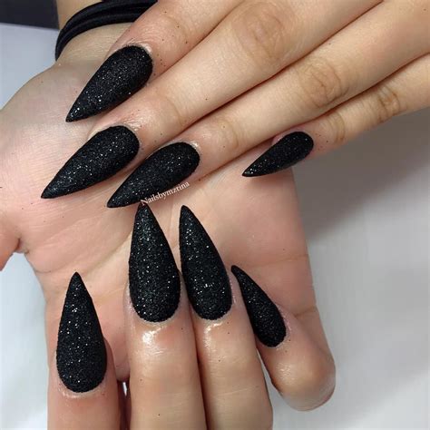 black sparkly nail ideas|black glitter stiletto nails.